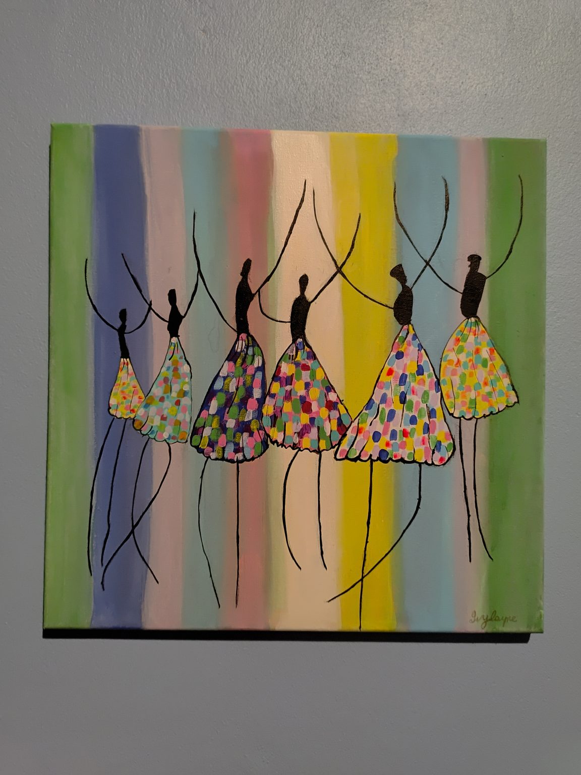 Astract,Silhouette dancing ladies with skirts of colours of the commonwealth.