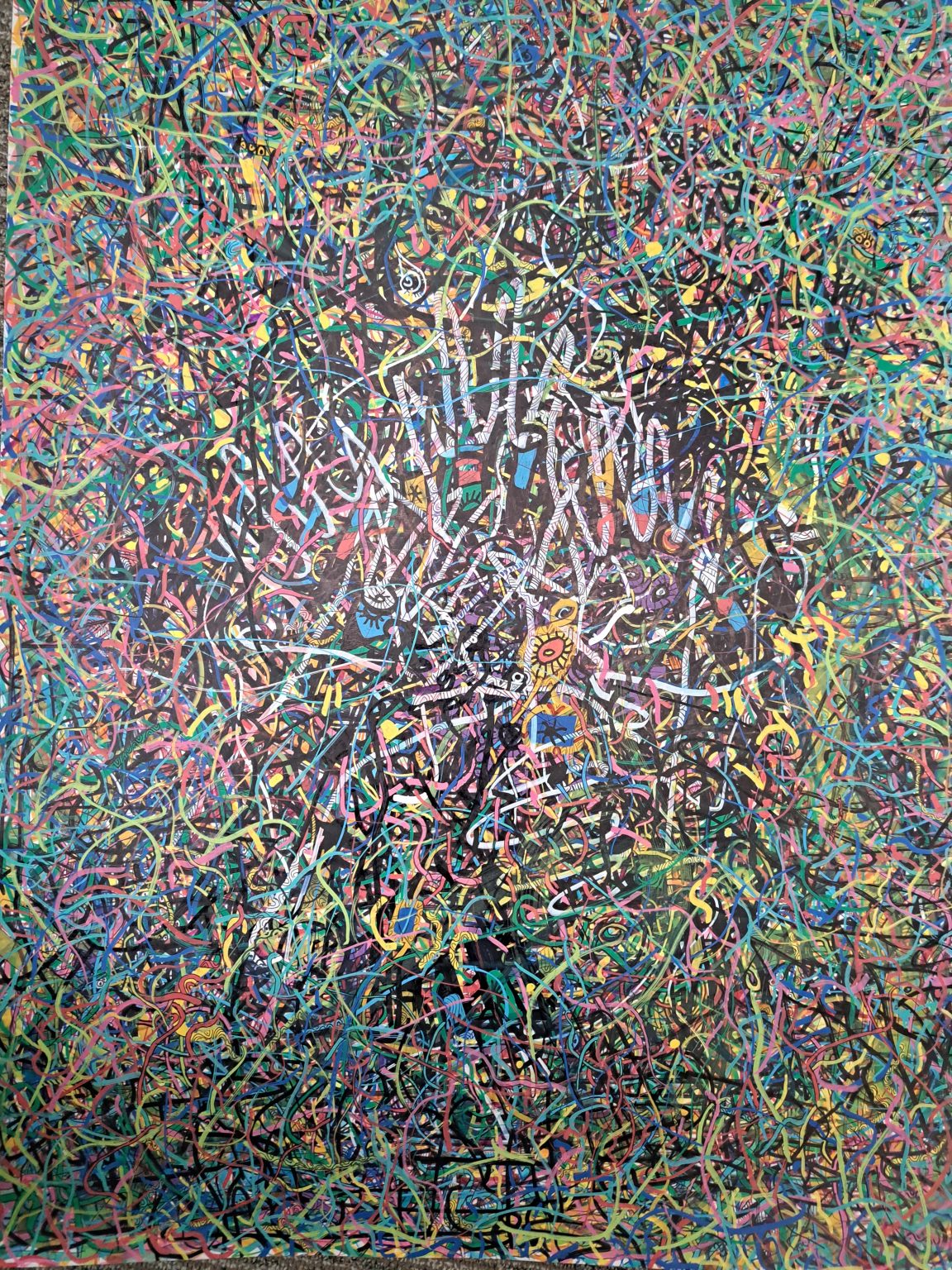 A dense all-over field of looping coloured lines — pink, green, blue and yellow — laid across a darker ground, with small figures, eyes and patterned shapes surfacing between the strands. The tangle never resolves into a single form.