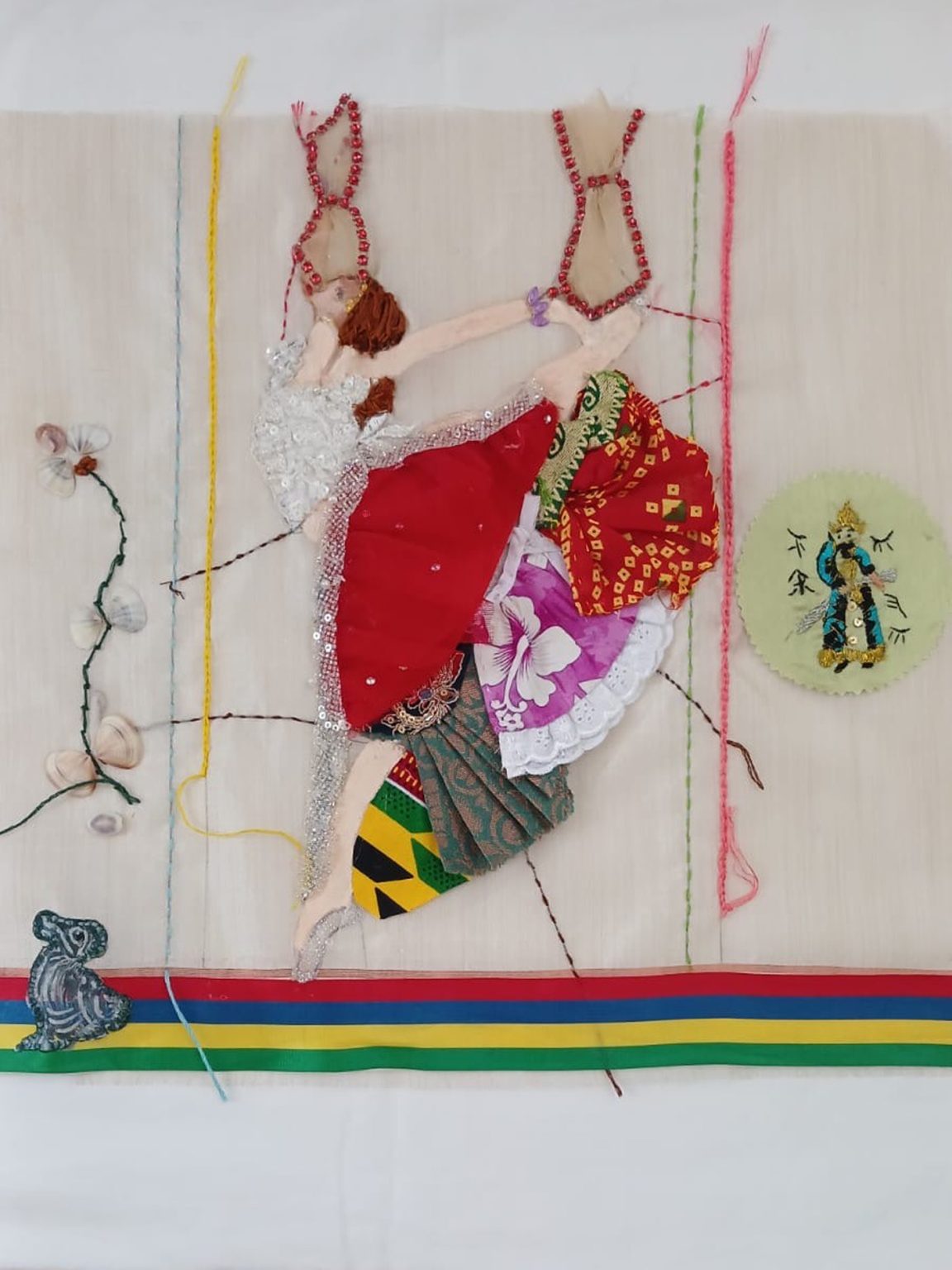 On the edge where Indian Ocean meets the sky, A ballet dancer lifts her dress tells the whole story of Mauritius.

The Shasiko stitches represent woman mended into one community and left it open to commonwealth community.

She is not just a dancer, she reminds us unity.