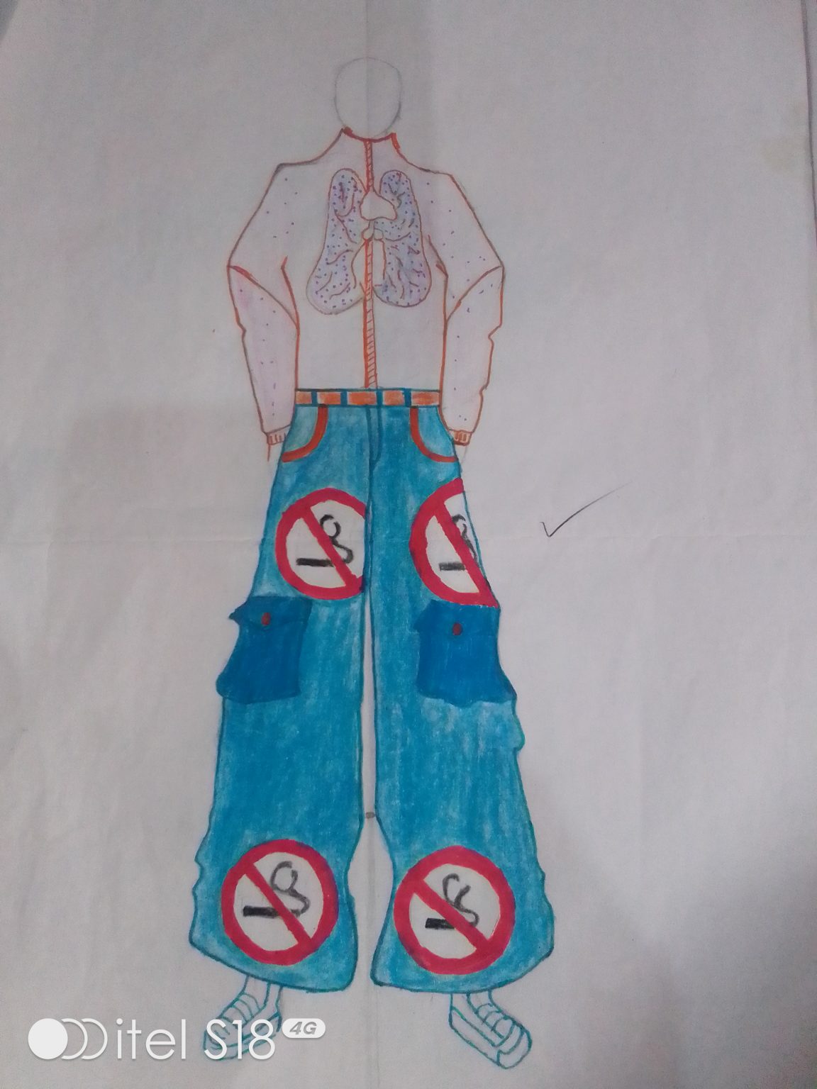 This illustration is communicating to people psychologically on how smoking can cause lung cancer .The upper part of the shirt  show lungs with some dots representing cancerous cells after medical screening.The pant part has DO NOT 🚫 SMOKE symbol warning people to stop smoking.