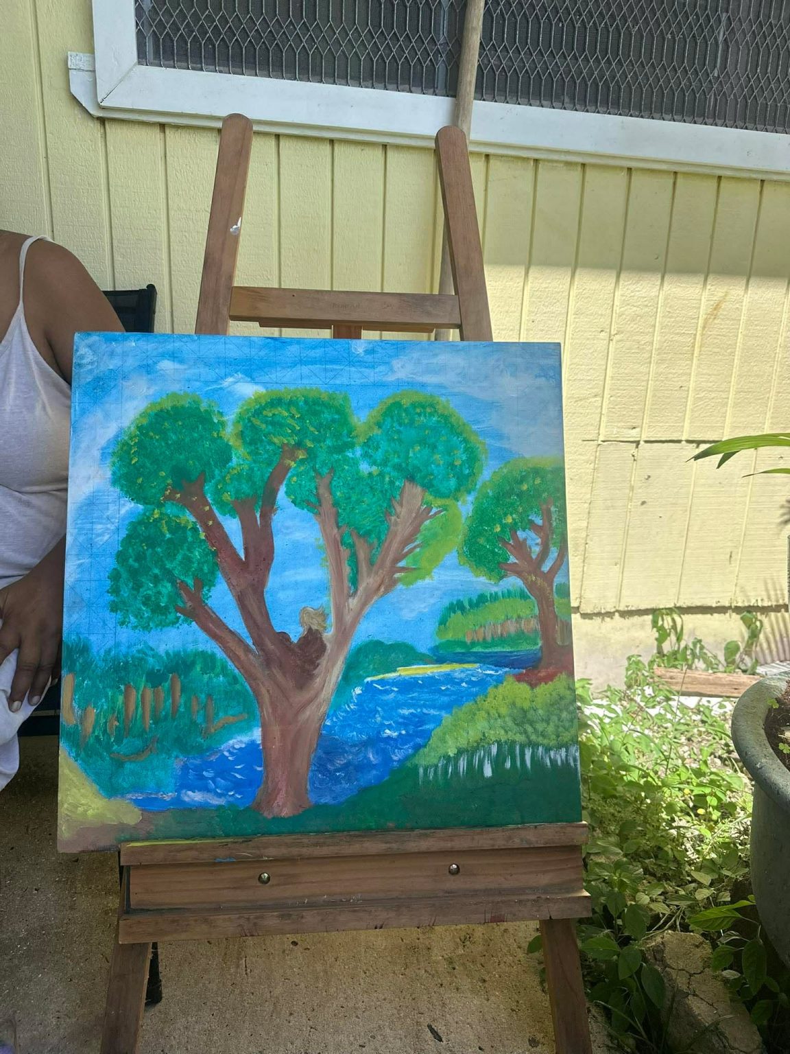 A young lady resting within the tree the only thing she calls home.
For the tree provides all she needs the tranquility of nature.
Ad she looks further into the view before her she realized that paying for peace wasn't costly at all.